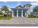 Exterior view of The Pier House featuring columns and an inviting entranceway at 8271 Redonda Loop, Lakewood Ranch, FL 34202