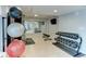 Bright gym features free weights, exercise balls, and a large mirror at 1111 N Gulfstream Ave # 8D, Sarasota, FL 34236