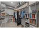 Organized walk-in closet with shelves, hanging rods, and storage boxes, maximizing space and accessibility at 11419 Gallatin Trl, Parrish, FL 34219
