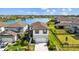 Beautiful two-story home with a well-manicured lawn and lake view in a Gathering-friendly neighborhood at 11419 Gallatin Trl, Parrish, FL 34219