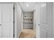 Bright hallway features shelving and white trim at 11419 Gallatin Trl, Parrish, FL 34219