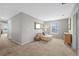 Upstairs bonus space with a daybed and lots of natural light at 11419 Gallatin Trl, Parrish, FL 34219