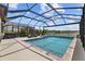 Beautiful pool with screened enclosure and integrated spa offers a relaxing outdoor oasis at 11419 Gallatin Trl, Parrish, FL 34219