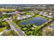 Aerial view showcasing home's prime location within the community with water views at 12019 Sawgrass Lake Ter, Bradenton, FL 34211