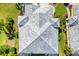 Top-down perspective displaying the roof and manicured landscaping at 12019 Sawgrass Lake Ter, Bradenton, FL 34211