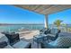 Balcony featuring comfortable seating and a stunning view of the waterfront at 1339 Westway Dr, Sarasota, FL 34236