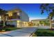 Stunning modern home showcasing sleek architectural design, a spacious driveway, and lush landscaping at 1339 Westway Dr, Sarasota, FL 34236