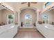 Bathroom features large tub, tile flooring, dual sinks and natural light at 20010 71St E Ave, Bradenton, FL 34211