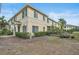 Exterior angle view of a home showcasing its architectural design at 208 Cape Harbour Loop # 108, Bradenton, FL 34212