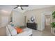 Inviting living room with vaulted ceilings, tile flooring, and stylish contemporary furnishings at 209 111Th E St, Bradenton, FL 34212