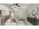 Comfortable living room with breakfast bar, contemporary furnishings, and neutral decor at 209 111Th E St, Bradenton, FL 34212