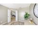 Bright office space with double doors leading into the living area featuring a large window and a stylish desk at 209 111Th E St, Bradenton, FL 34212