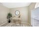 Bright office space featuring a large window, neutral walls, a stylish desk, and a comfortable chair at 209 111Th E St, Bradenton, FL 34212