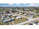 Wide-angle aerial view of neighborhood showcasing dense residential area, streets, and community layout at 211 Dalton Blvd, Port Charlotte, FL 33952