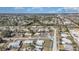 Extensive aerial view of a community, highlighting neighborhood streets and many residences at 211 Dalton Blvd, Port Charlotte, FL 33952