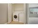 Convenient laundry closet with washer and dryer at 3769 Parkridge Cir # 4-103, Sarasota, FL 34243