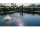 Water view with sparkling fountain, showcasing the well-maintained landscaping and serene setting at 3810 75Th W St # 123, Bradenton, FL 34209