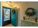 Bright foyer area with views to the outside and decorative touches at 3810 75Th W St # 123, Bradenton, FL 34209