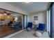 Inviting lanai with tile flooring, comfortable seating, and open access to the bright and airy living spaces at 3810 75Th W St # 123, Bradenton, FL 34209