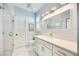 Modern bathroom featuring a glass shower, sleek countertops, and contemporary fixtures at 432 W Gate Dr, Venice, FL 34285