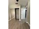 Bedroom with mirrored closet doors and laminate flooring at 4509 30Th Street E Cir, Bradenton, FL 34203