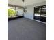The enclosed lanai features seamless access to the pool area with a pass-through window at 4509 30Th Street E Cir, Bradenton, FL 34203