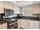 Updated kitchen featuring stainless steel appliances and granite countertops at 4608 Park Acres Dr, Bradenton, FL 34207