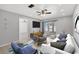 Nicely staged living room with modern decor, ceiling fan, and tile flooring at 4608 Park Acres Dr, Bradenton, FL 34207