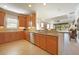 Kitchen features granite counters, stainless appliances, tile backsplash, and an open floor plan at 5020 Savona Run, Bradenton, FL 34211