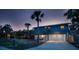 Charming two-story home with an attached two-car garage and outdoor space at 5250 Calle De Rio, Sarasota, FL 34242