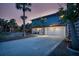 Charming two-story home with an attached two-car garage and outdoor space at 5250 Calle De Rio, Sarasota, FL 34242