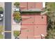 Aerial view of the townhome showcasing its roof and driveway at 625 Duchess Blvd, Dunedin, FL 34698