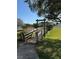 Quaint wooden bridge in a well-maintained backyard setting at 625 Duchess Blvd, Dunedin, FL 34698