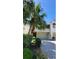 Charming two-story townhome surrounded by lush tropical landscaping at 625 Duchess Blvd, Dunedin, FL 34698