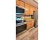 Modern kitchen equipped with stainless steel appliances and granite countertops at 625 Duchess Blvd, Dunedin, FL 34698