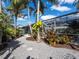 Landscaped backyard with rock garden and screened in pool area at 721 Cadiz Rd, Venice, FL 34285