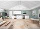 Spacious screened patio featuring full kitchen, tile flooring, and ample seating at 721 Cadiz Rd, Venice, FL 34285