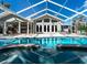 Beautiful backyard pool area with access to the home's living area at 721 Cadiz Rd, Venice, FL 34285