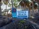 Welcome to Venice Beach sign with palm trees and blue sky at 721 Cadiz Rd, Venice, FL 34285
