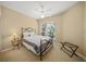 Cozy bedroom with carpet flooring, a window view, and neutral tones for a relaxing atmosphere at 7911 Kavanagh Ct, Sarasota, FL 34240