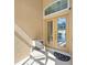 Cozy front porch with seating offers a welcoming spot to relax at 7911 Kavanagh Ct, Sarasota, FL 34240