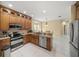 Well-equipped kitchen with stainless steel appliances, granite countertops, and ample cabinet space at 7911 Kavanagh Ct, Sarasota, FL 34240