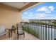 Balcony with comfortable seating and a beautiful view of the water at 147 Tampa E Ave # 702, Venice, FL 34285