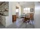 Charming dining room with built-in shelves and lots of natural light at 1555 Flower Dr, Sarasota, FL 34239