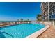 Beautiful community pool overlooks the beach and ocean at 231 Hourglass Way # V5, Sarasota, FL 34242