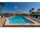 Community pool offers residents a refreshing and relaxing space at 231 Hourglass Way # V5, Sarasota, FL 34242