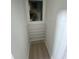 Interior of a closet with wire rack shelving and natural lighting from a window at 2900 Woodpine Ct, Sarasota, FL 34231
