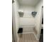 Walk-in closet featuring shelves and hanging racks for optimized storage at 2900 Woodpine Ct, Sarasota, FL 34231