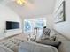 Comfortable living room with stylish decor and ample seating, ideal for relaxing and entertaining guests at 2900 Woodpine Ct, Sarasota, FL 34231