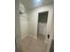 Spacious walk-in closet with wire shelving and a doorway at 2900 Woodpine Ct, Sarasota, FL 34231